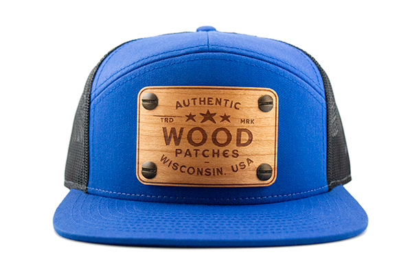 Blue7-panel cap with cherry wood patch.