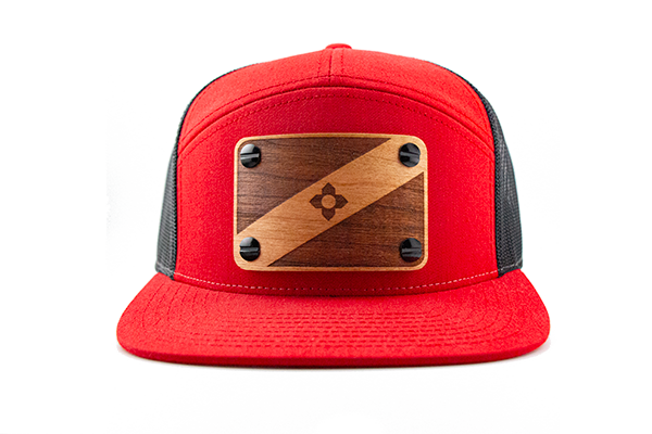Red 7-panel cap with cherry wood patch.
